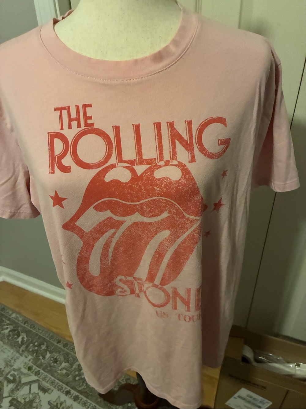 the Rolling Stones Pink Tee with Distressed Orange Tongue Graphic